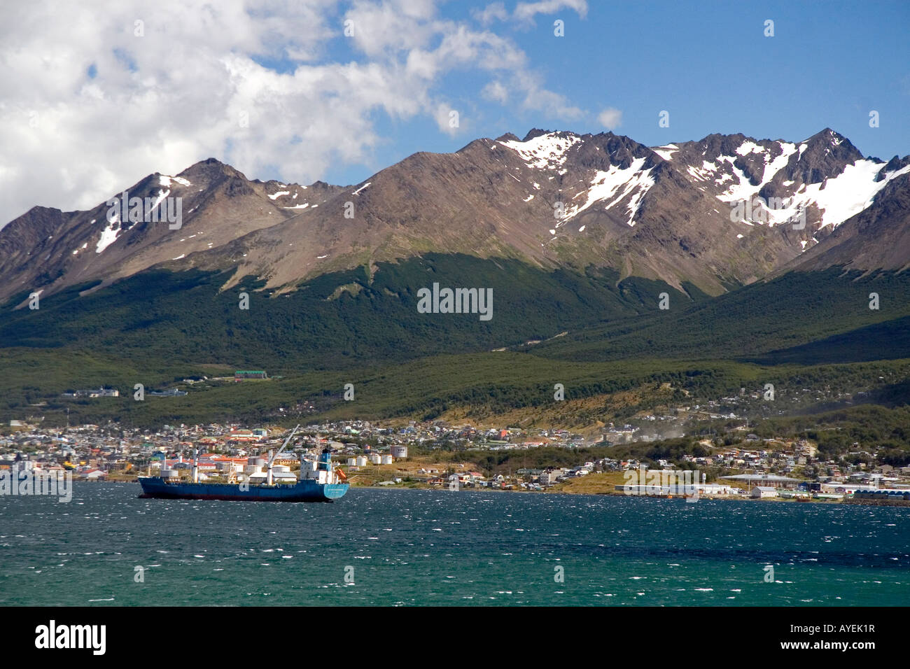 The harbor and city of Ushuaia below the Martial mountain range on the island of Tierra del Fuego Argentina Stock Photo