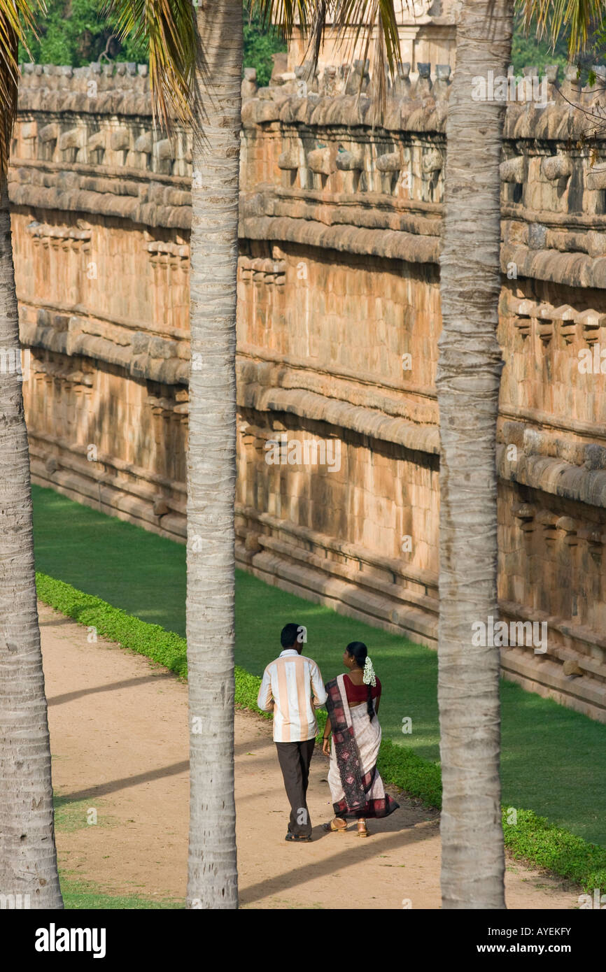 Young Indian Couple Stroll at Brihadishwara Hindu Temple in Thanjavur South India Stock Photo
