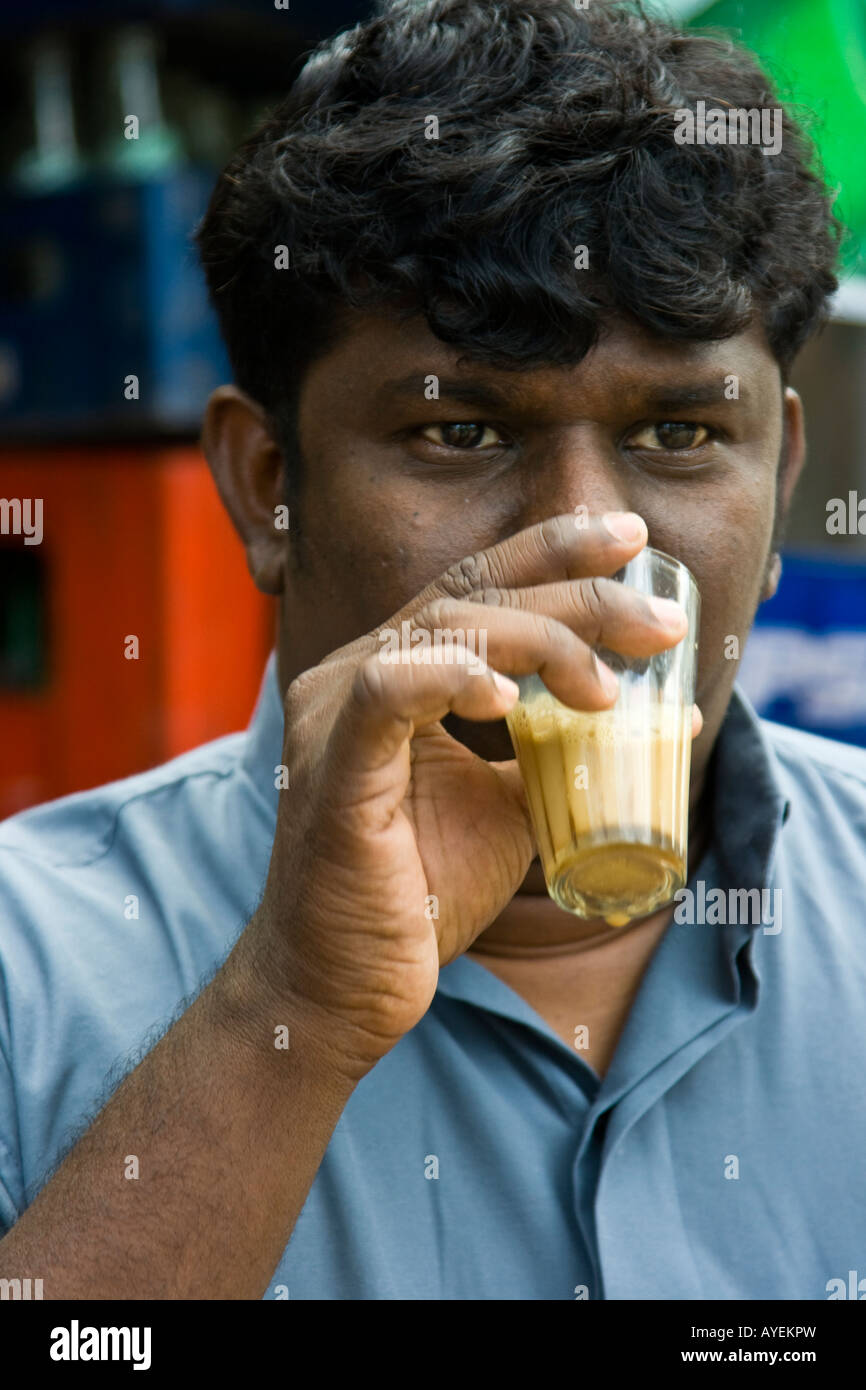 Indian Man Drinking Chai Tea inside Vellore Fort in Vellore South India