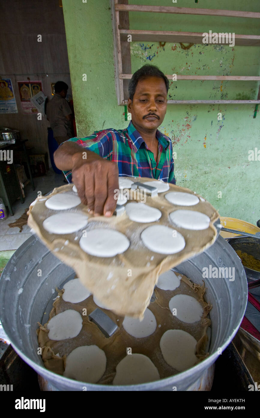 Man Cooking Idly in Mamallapuram South India Stock Photo
