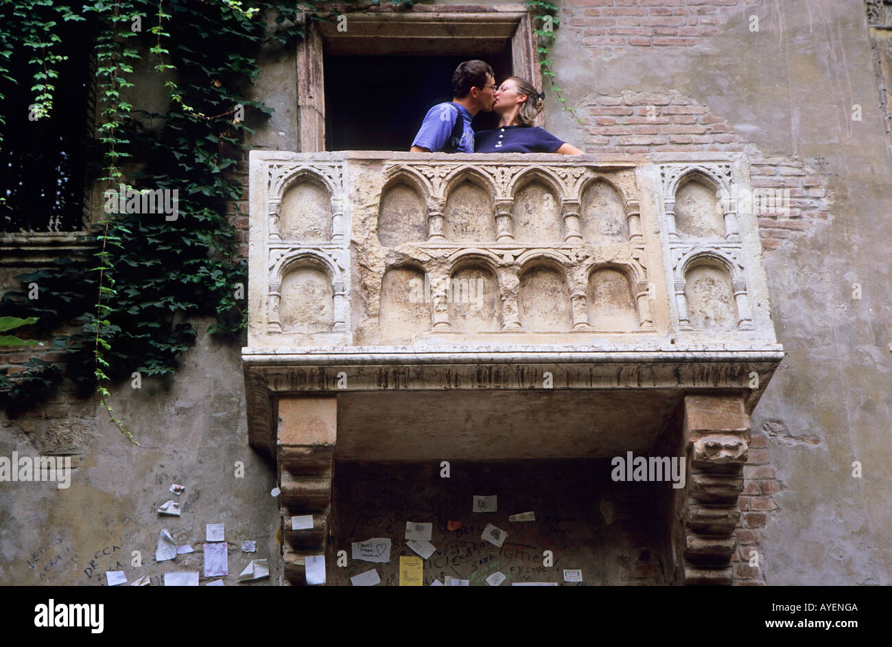 A couple kissing on the balcony of Juliet s House Casa de Giulietta Via Capello Verona Stock Photo