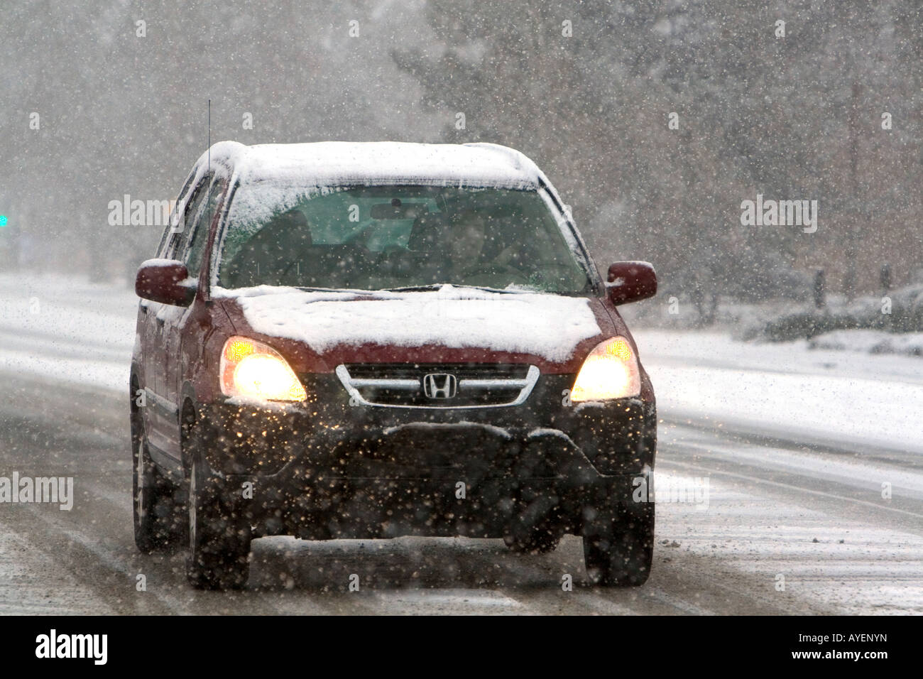 Automobile driving on a snowy day in Boise Idaho Stock Photo