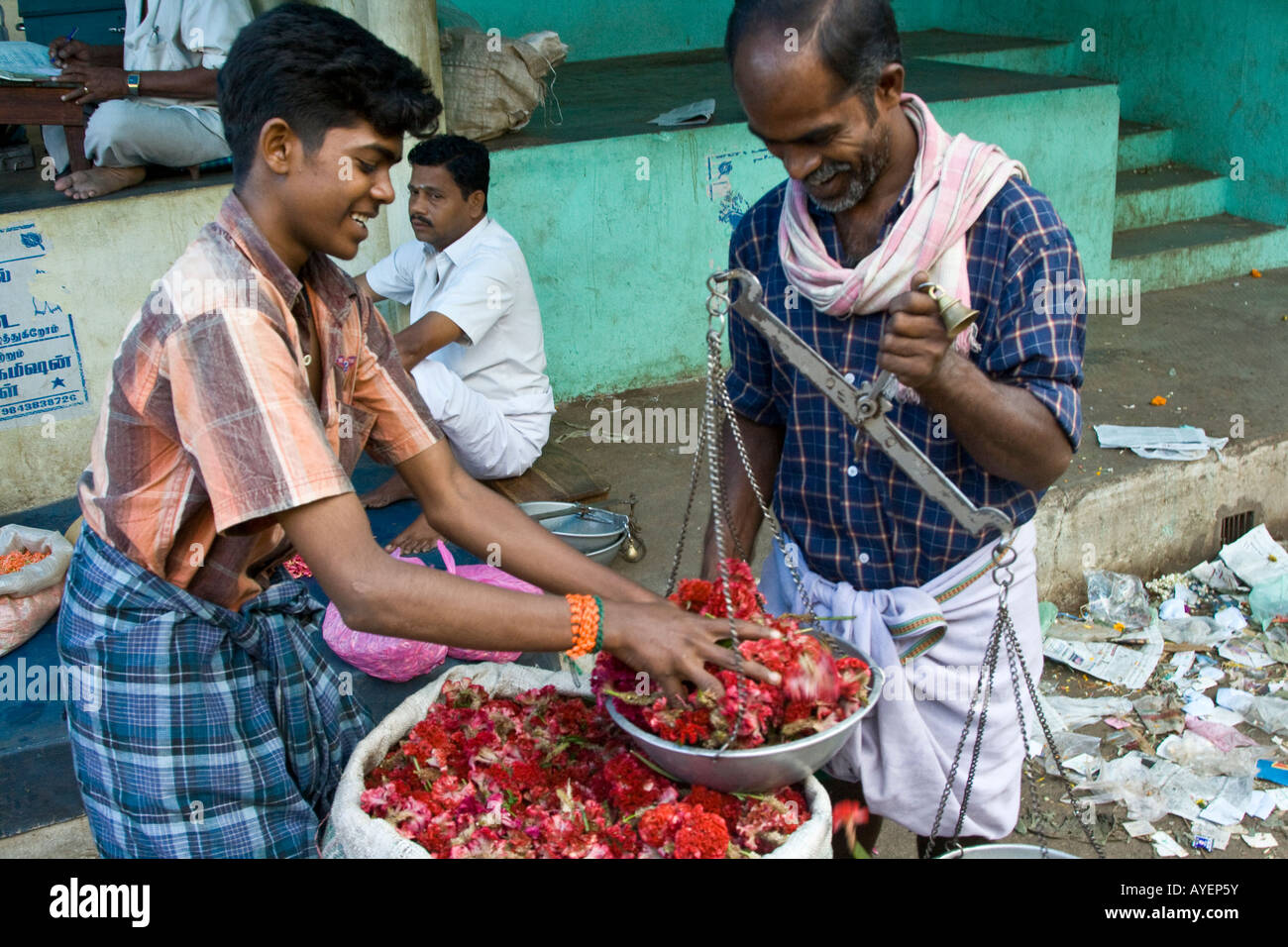 Measuring Flowers in the Flower Market in Madurai South India Stock Photo