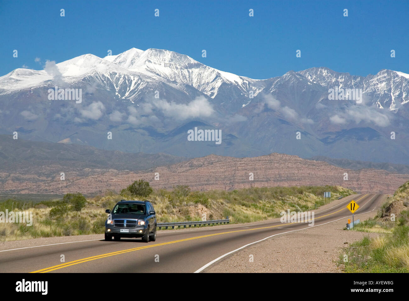 A view of the Andes Mountain Range with traffic on highway 7 near Mendoza Argentina Stock Photo