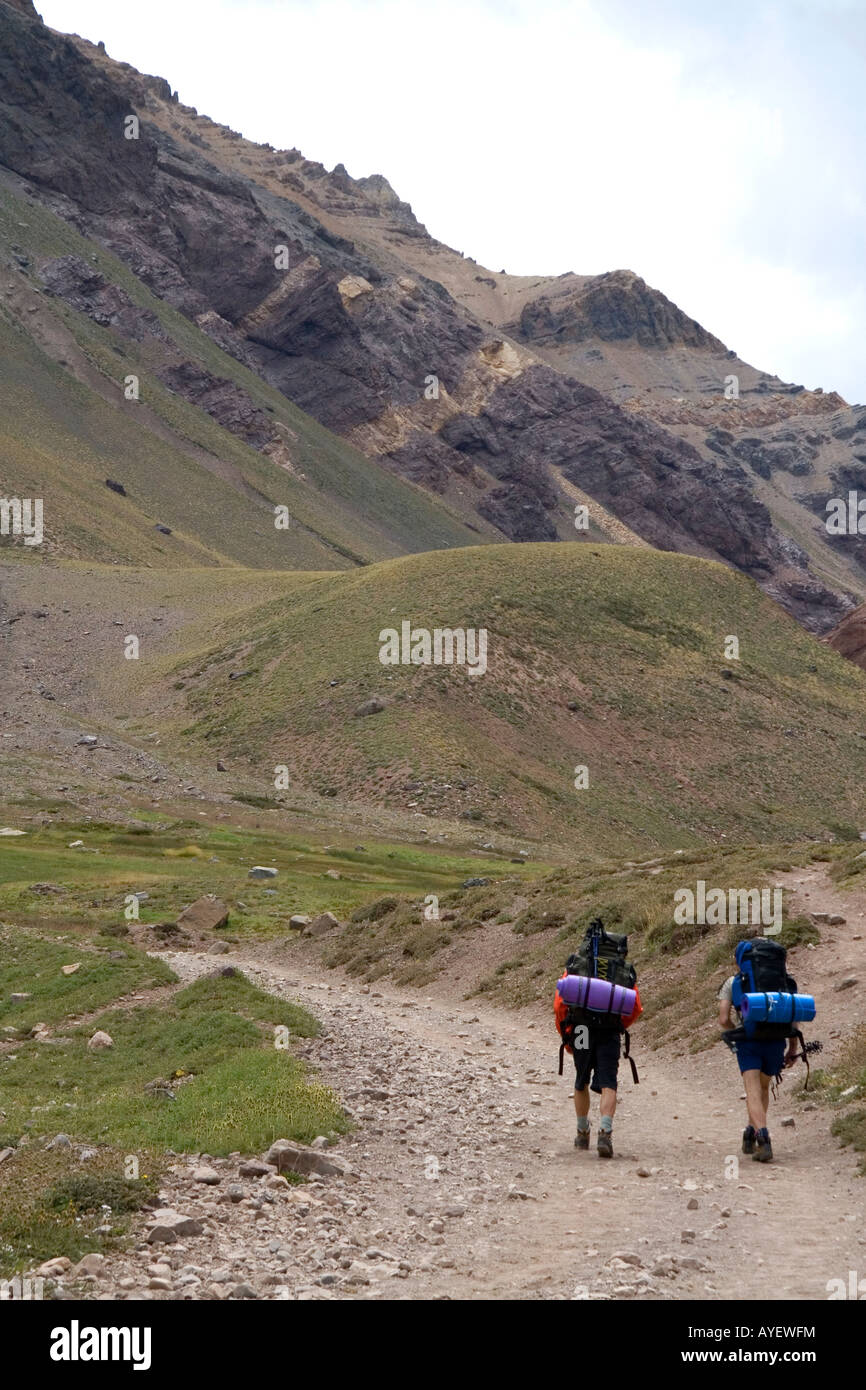 Hikers on a trail in the Andes Mountain Range Argentina Stock Photo