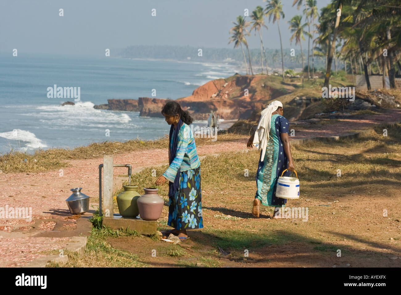 Woman drawing water from well hires stock photography and images Alamy