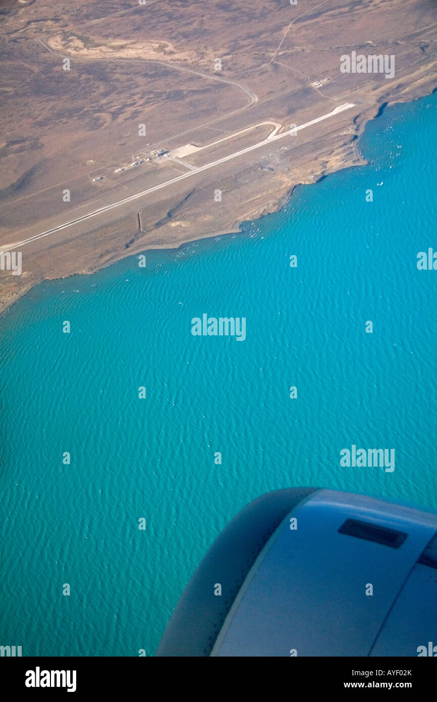 Aerial view of El Calafate airport along Lake Argentino from the window of an airplane Patagonia Argentina Stock Photo