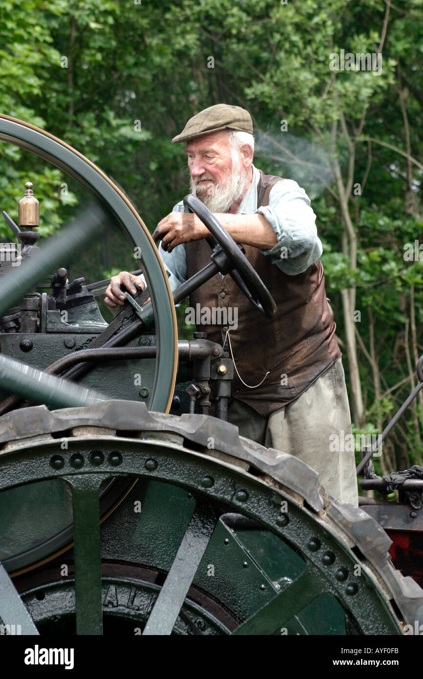 Elderly man running a traction engine Stock Photo