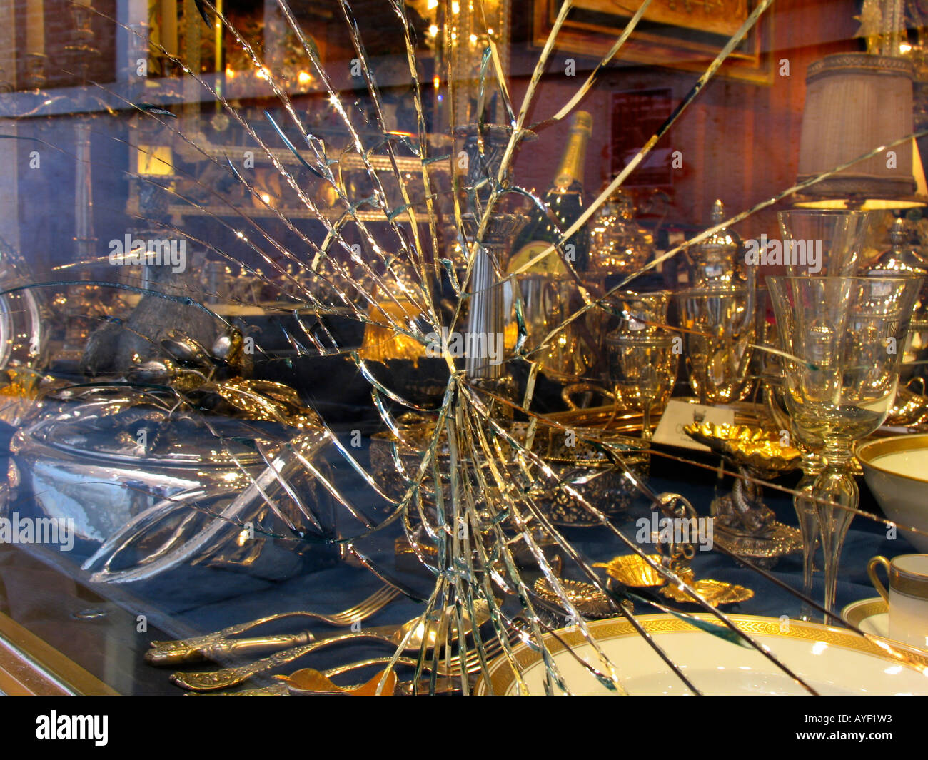 Smash and grab in antique shop Stock Photo