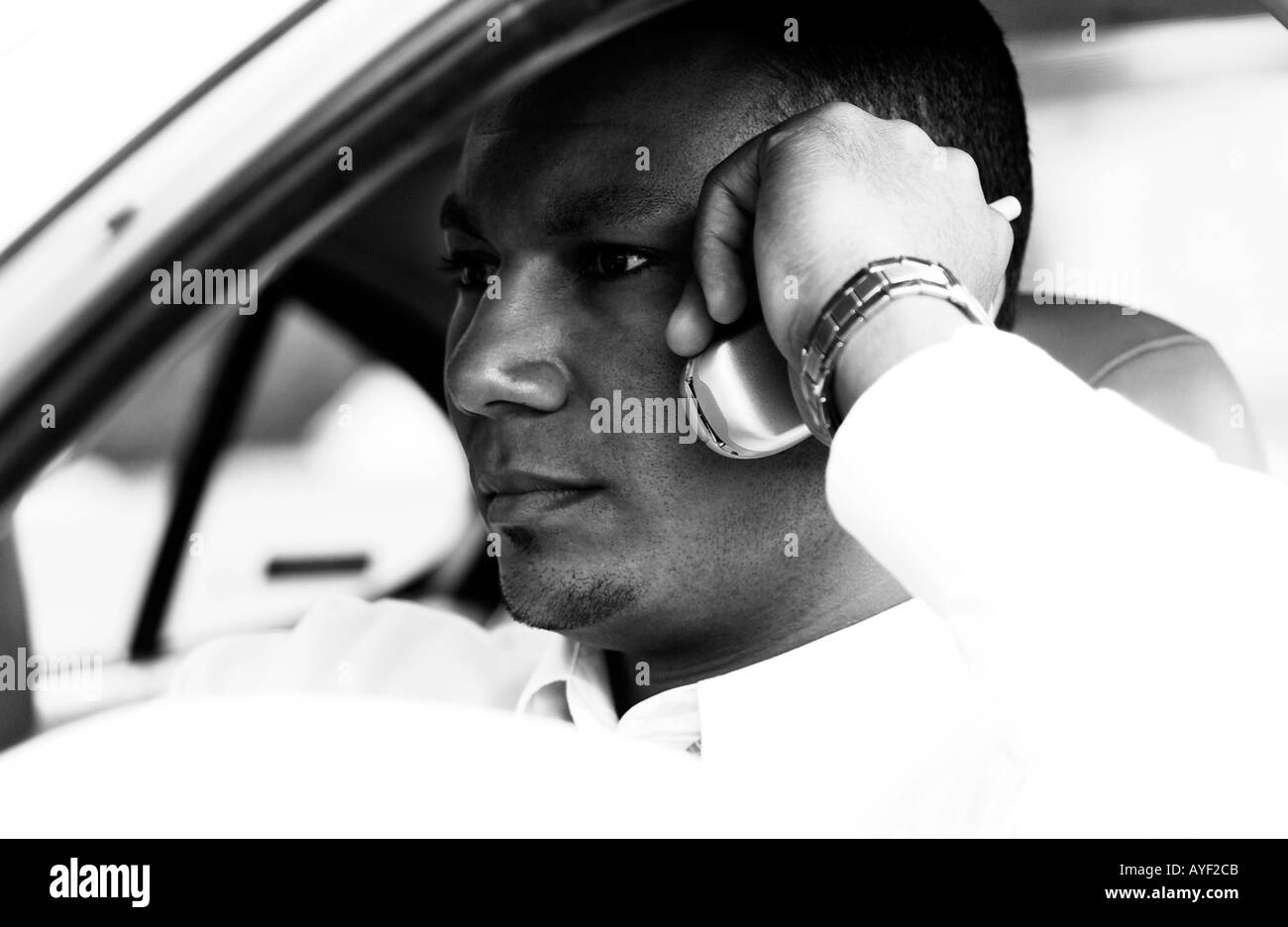 Man On Cell Phone In Car Stock Photo Alamy