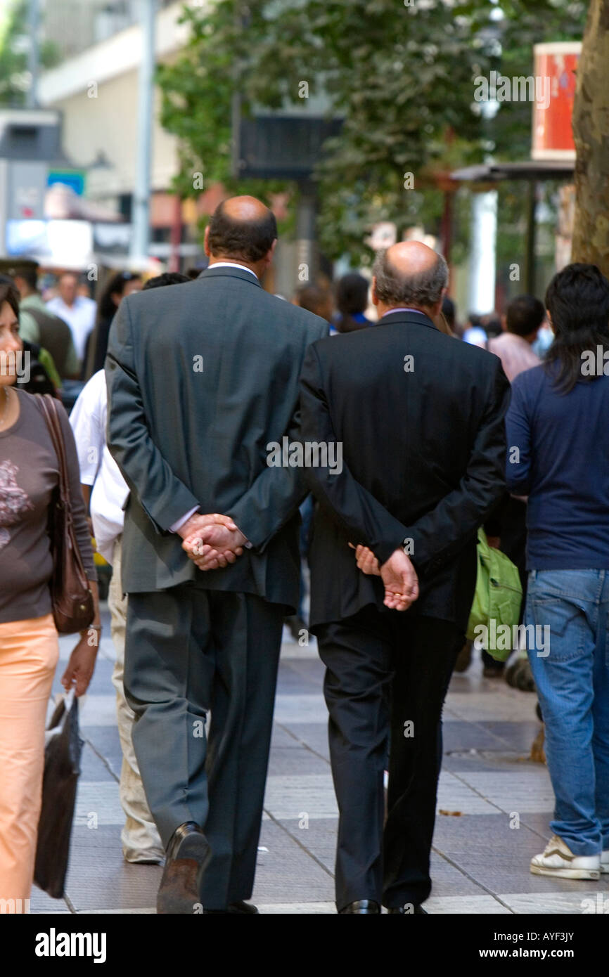 Businessmen walk on the Paseo Ahumada in Santiago Chile Stock Photo