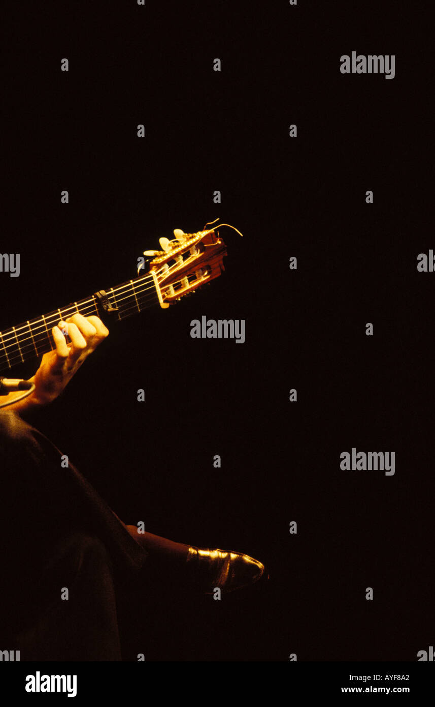 Hand and guitar neck of a Flamenco guitarist Stock Photo