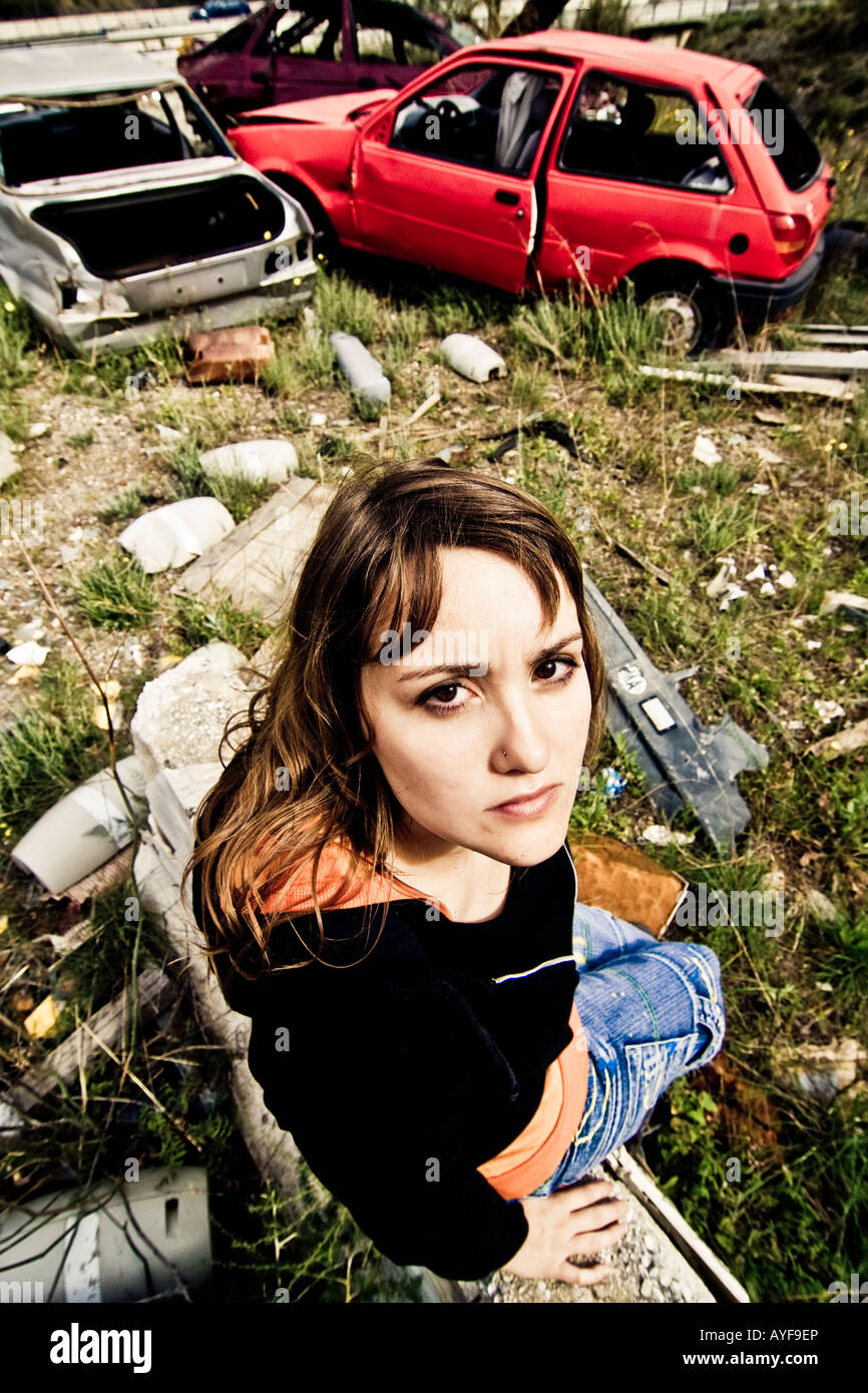 Young woman in the scrapyard Stock Photo Alamy