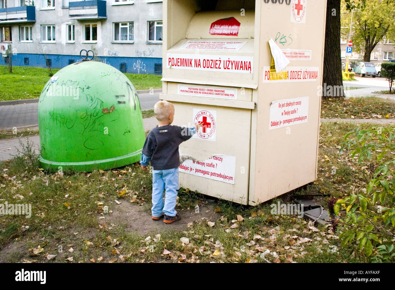 Eve erektion ribben Red Cross bin for recycling clothing. Lodz Central Poland Stock Photo -  Alamy