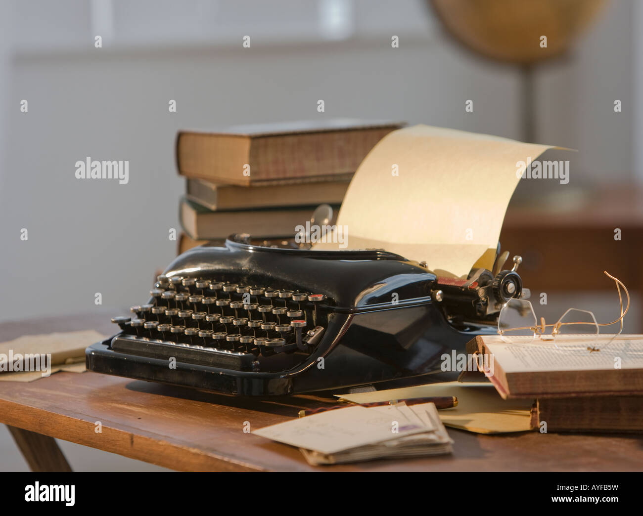 Antique typewriter on table Stock Photo