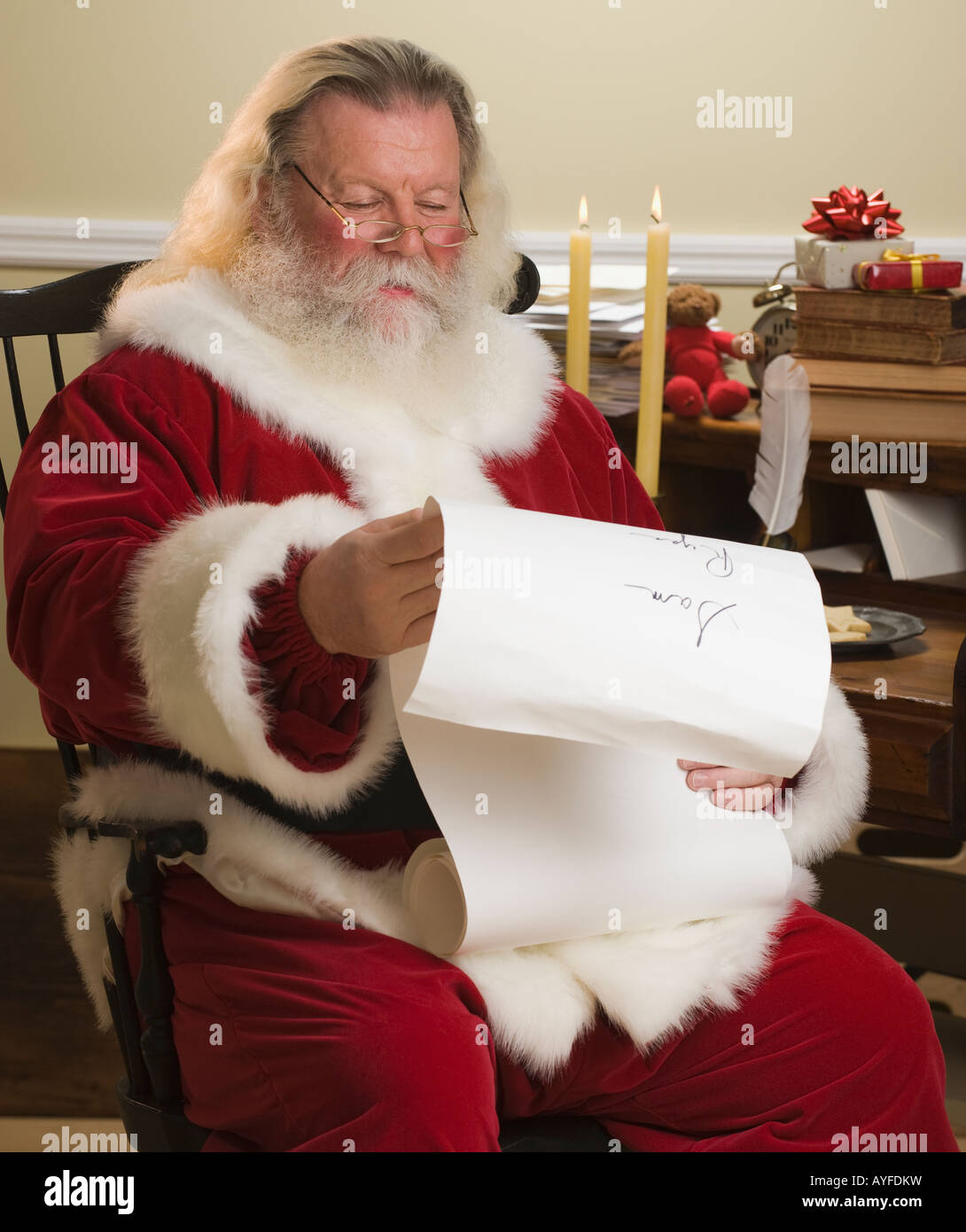 Santa Claus Reading List Of Names Stock Photo 17092668 Alamy