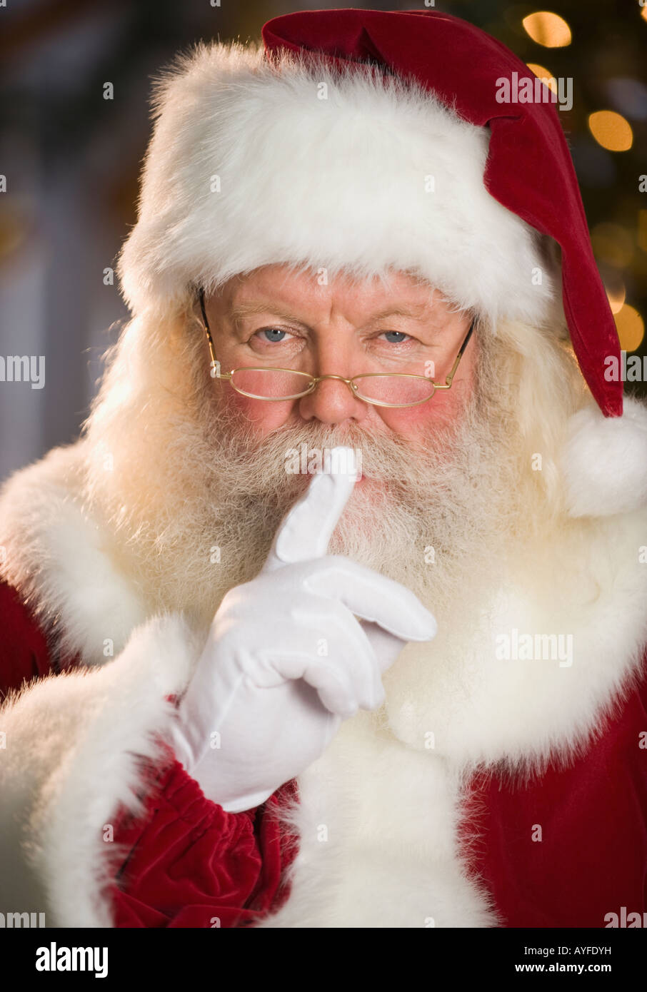 Santa Claus shushing Stock Photo