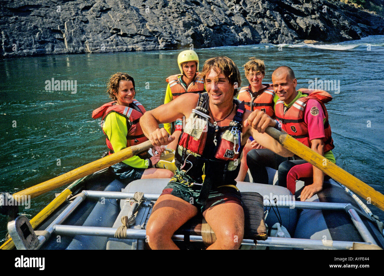 Group on calm stretch of Zambezi River while whitewater rafting ...