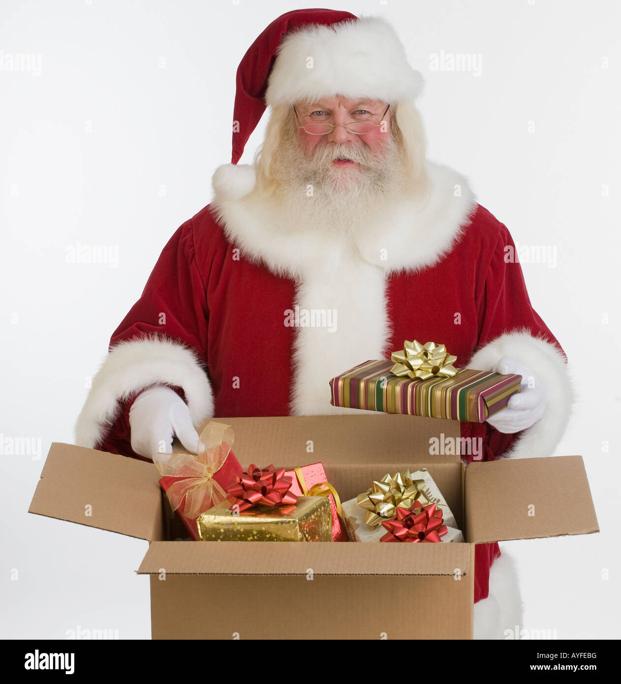 Santa Claus Delivering Gifts High Resolution Stock Photography and