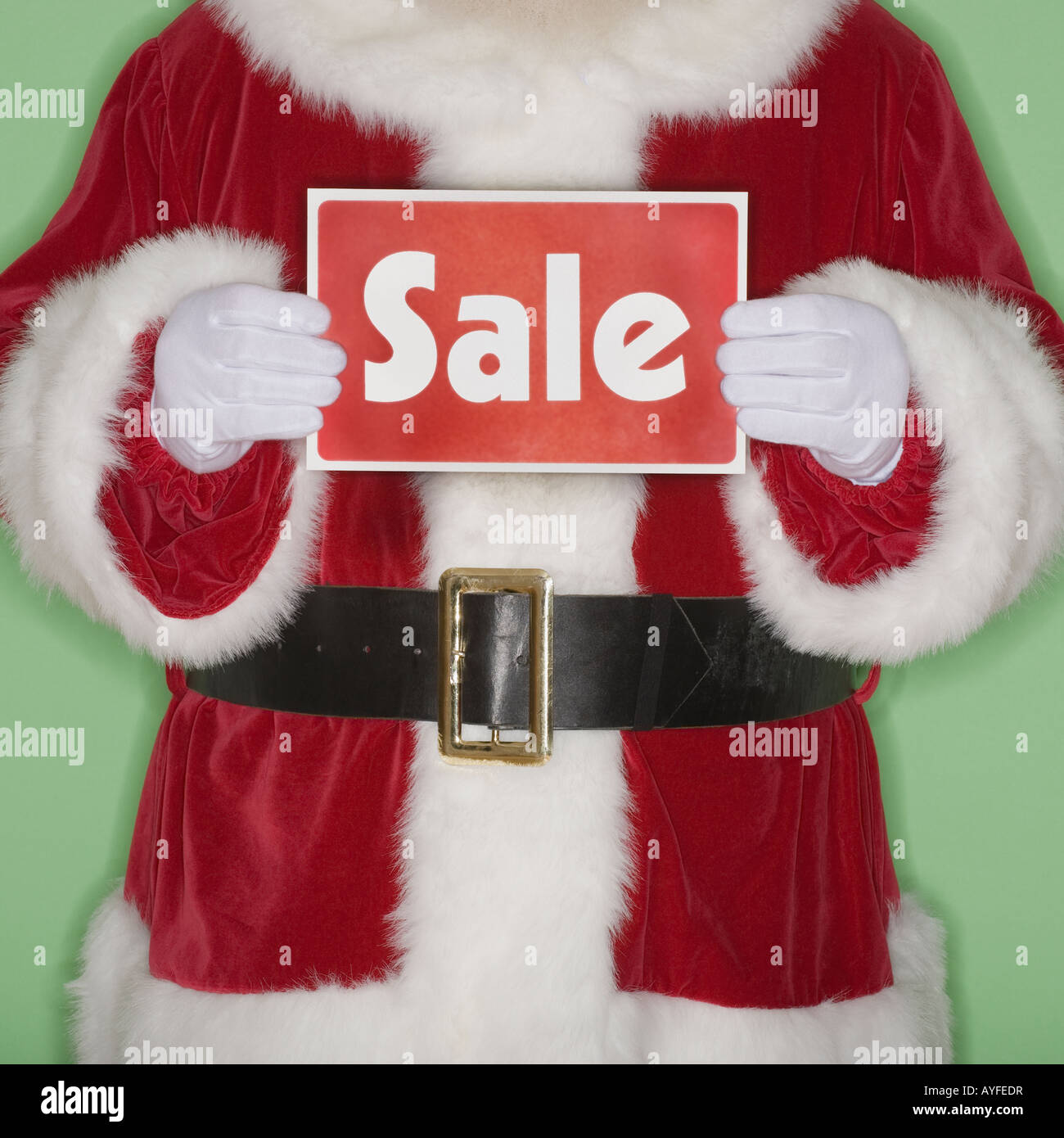 Santa Claus holding Sale sign Stock Photo Alamy