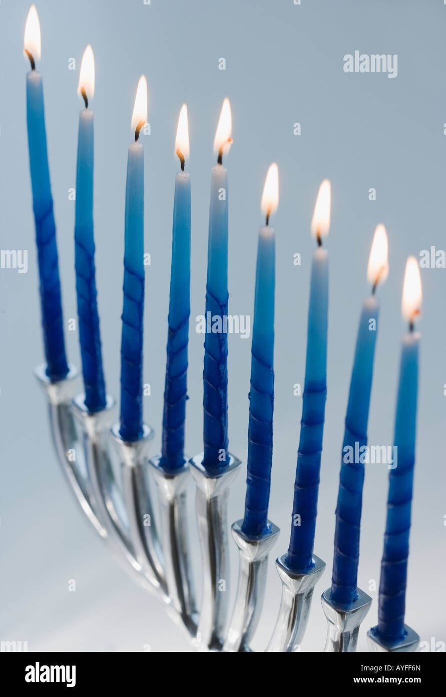 Close up of menorah with lit candles Stock Photo Alamy