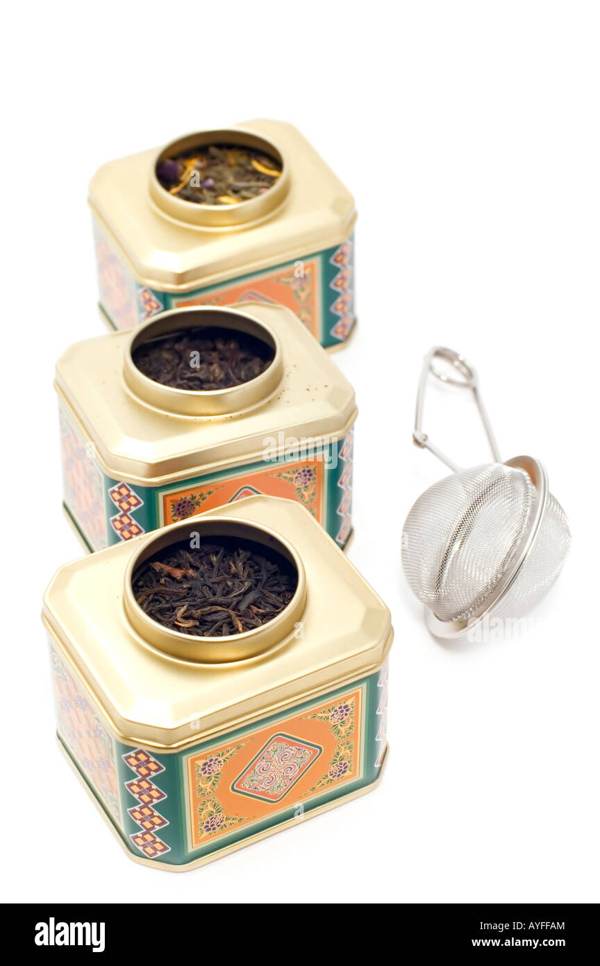 object on white kitchen utensil tea strainer with tea box Stock Photo