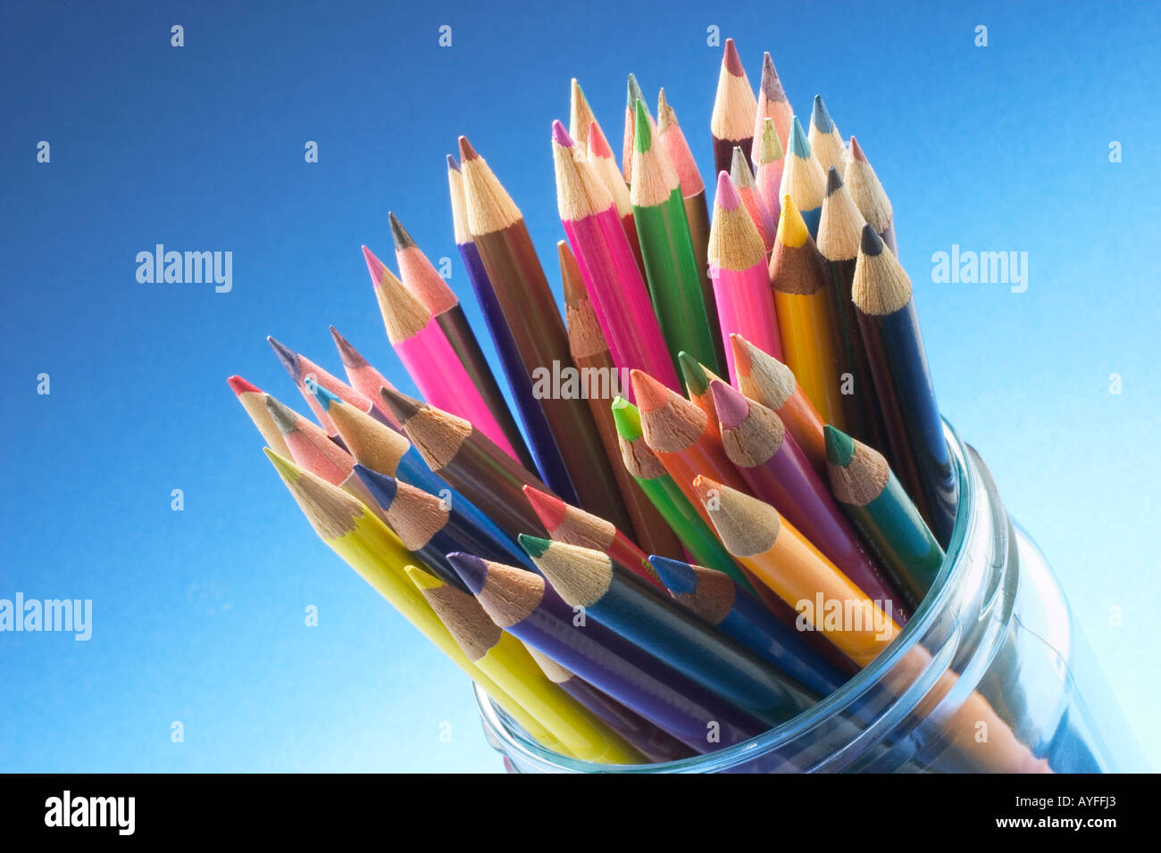 Colour Pencils in Glass Bottle Stock Photo Alamy