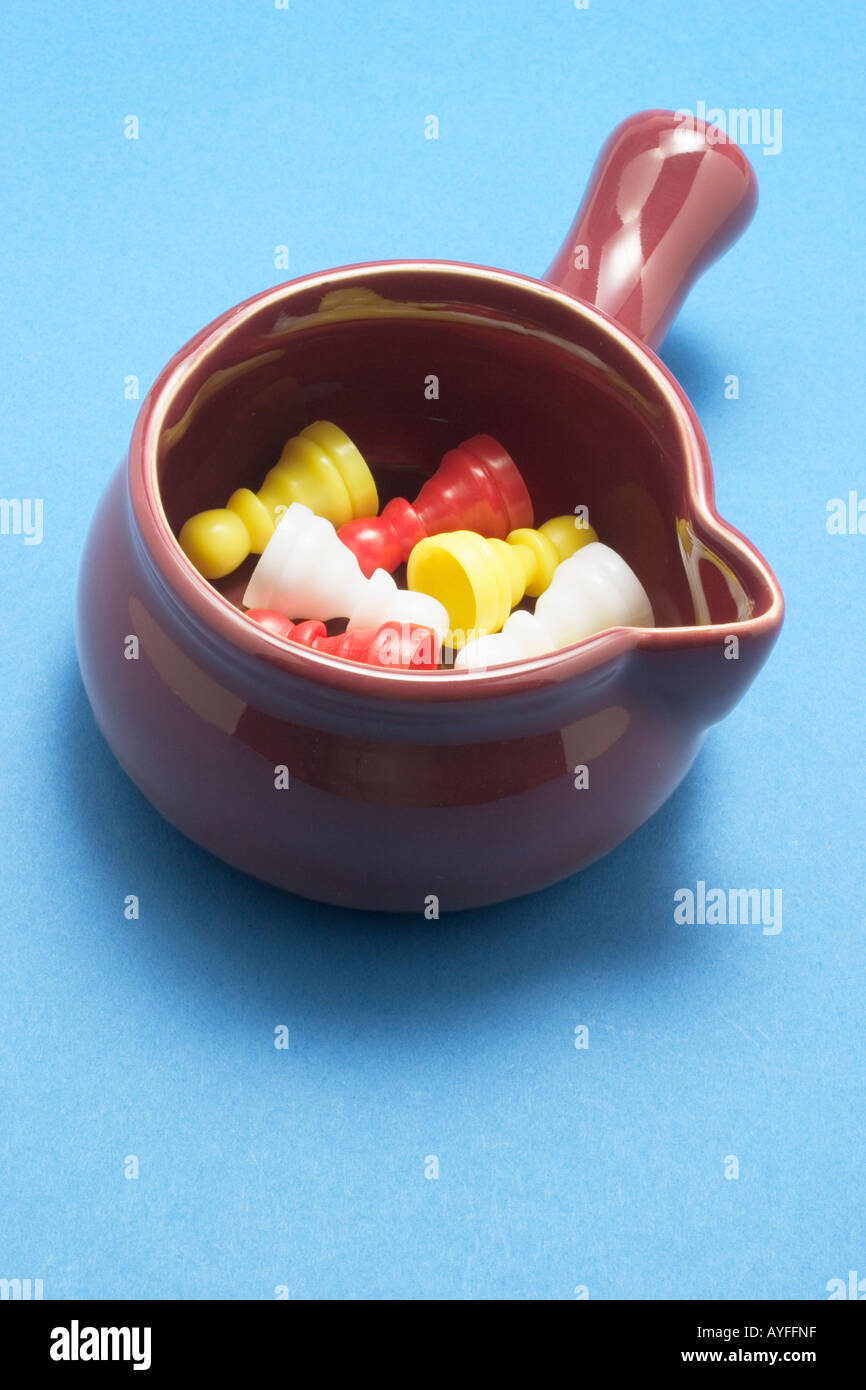 Game Pieces in Saucepan Stock Photo Alamy