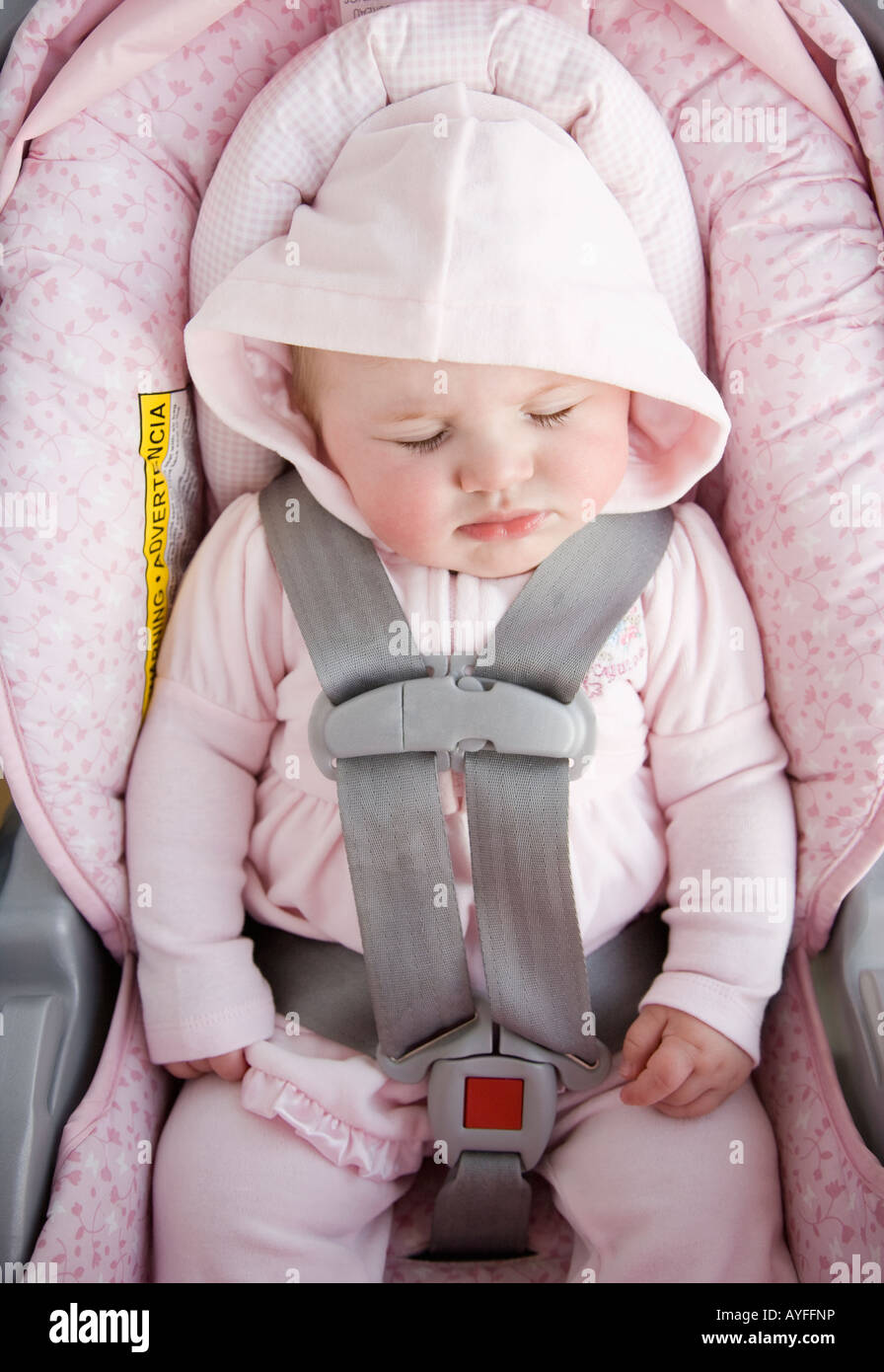 Baby sleeping in car seat Stock Photo Alamy