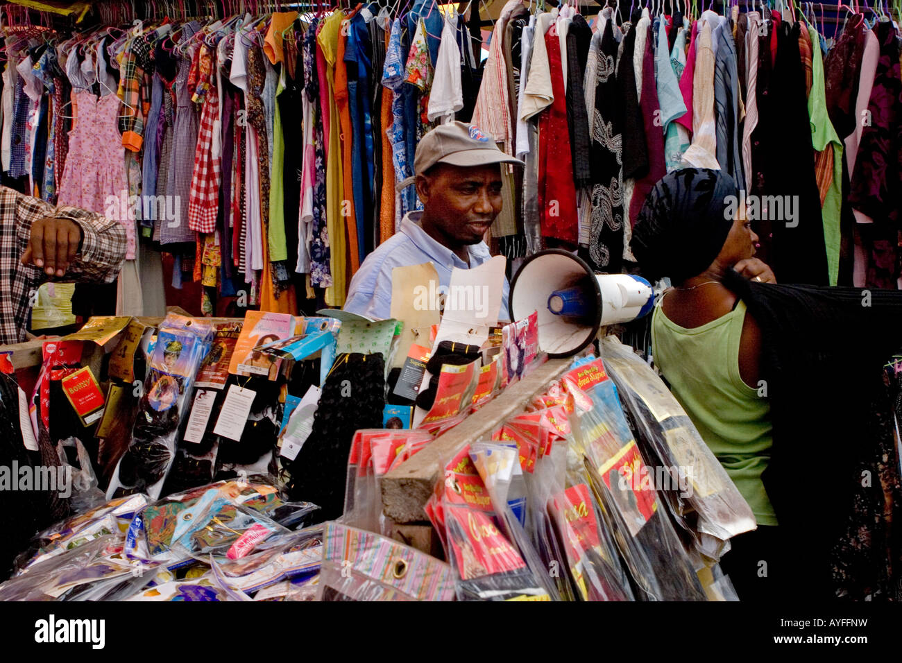 Stallholder selling clothes and accessories, MontBouet Market, largest