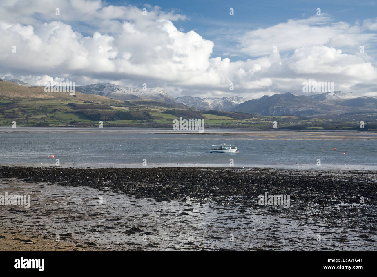 The Menai Strait looking from Beaumaris Anglesey towards Snowdonia on mainland north Wales, United Kingdom Stock Photo