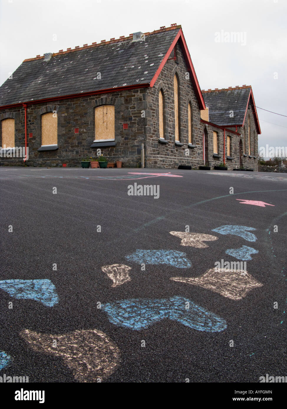 Llandre primary school closed boarded up windows and shuttered , near