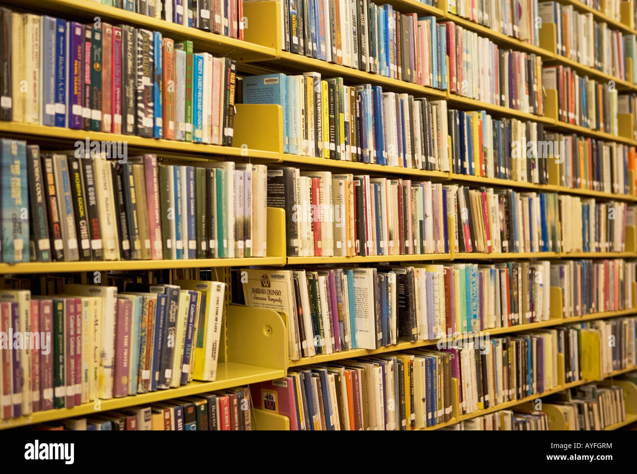 books on library shelves Stock Photo Alamy