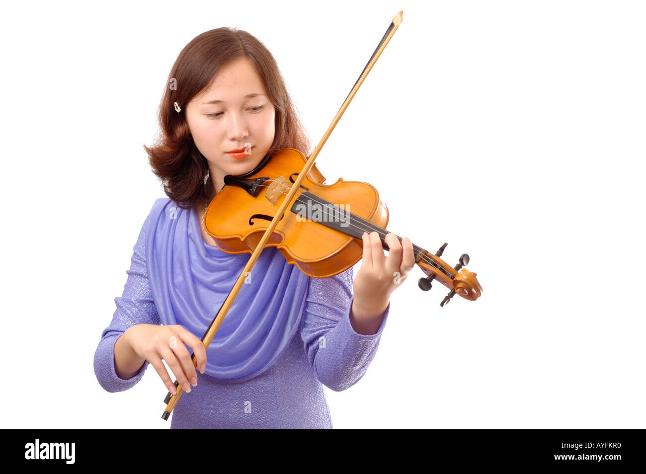 Teenage girl playing the violin Stock Photo - Alamy