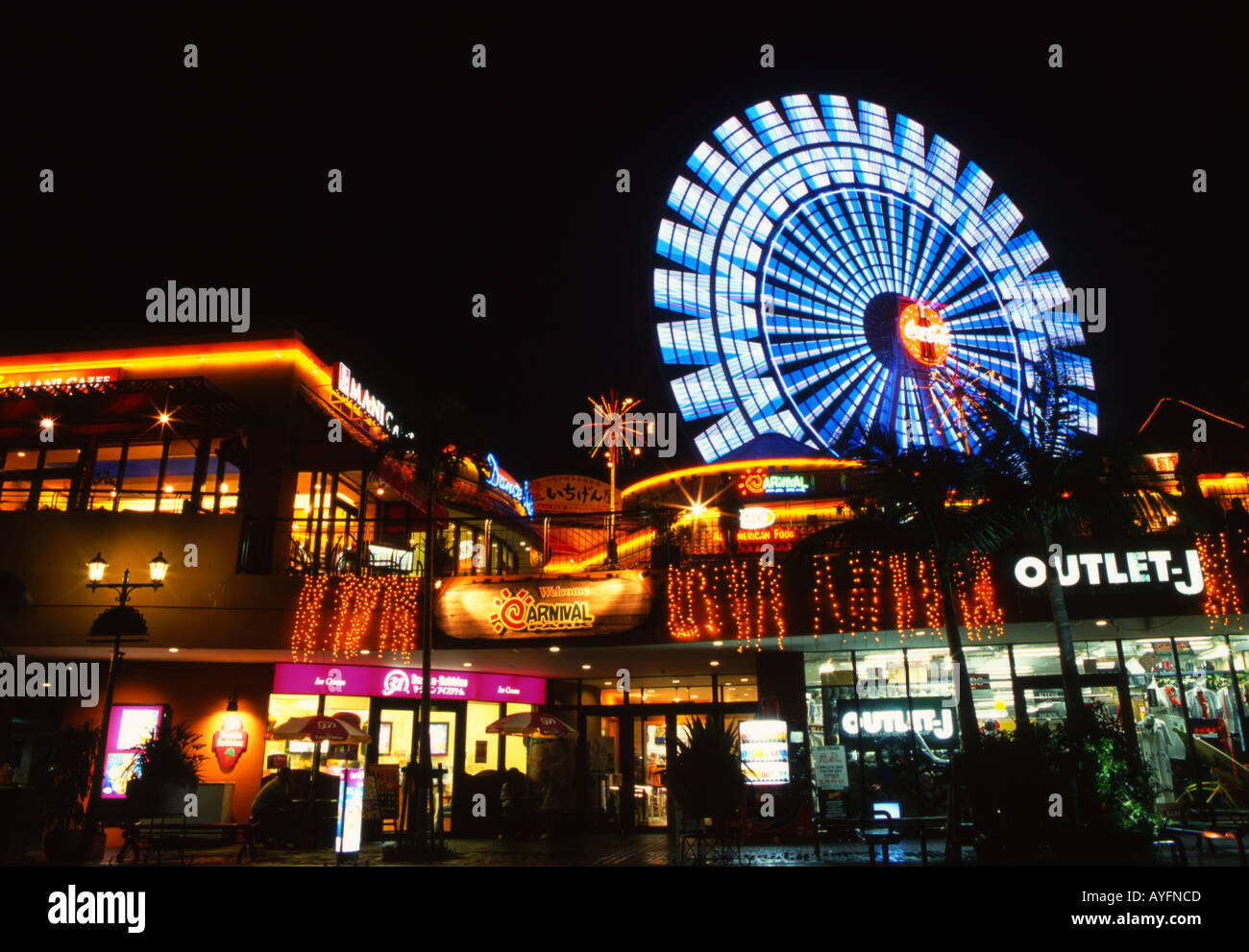 Neon Lights And Ferris Wheel Of American Village Chatan Town Stock Photo Alamy