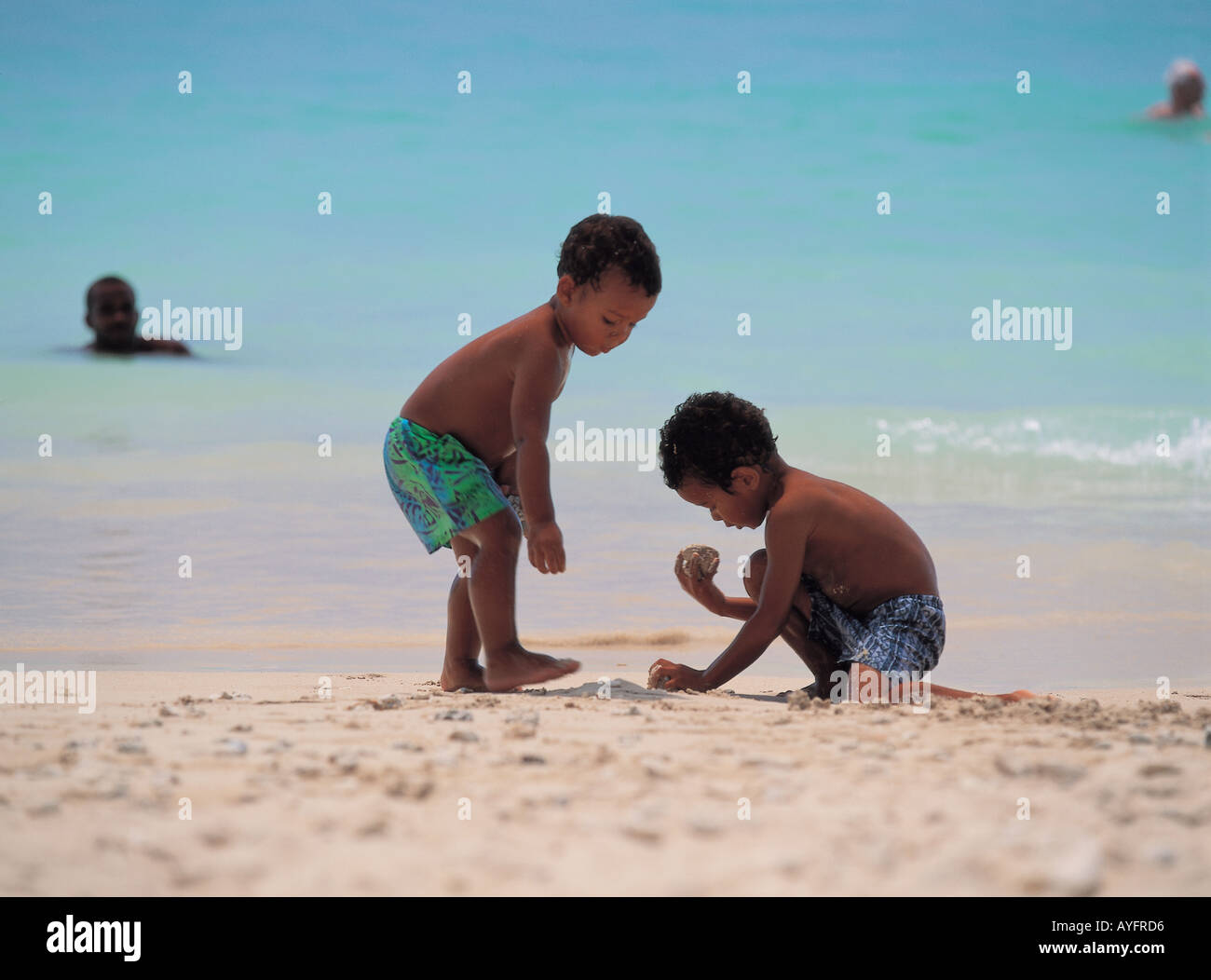 Kids and Sand Stock Photo - Alamy
