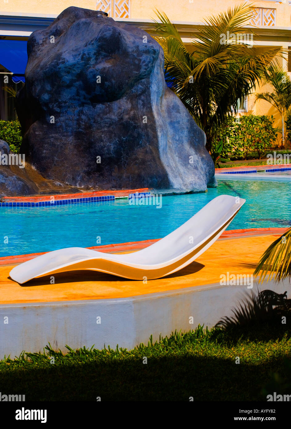 Mauritian landscaped swimming pool hires stock photography and images