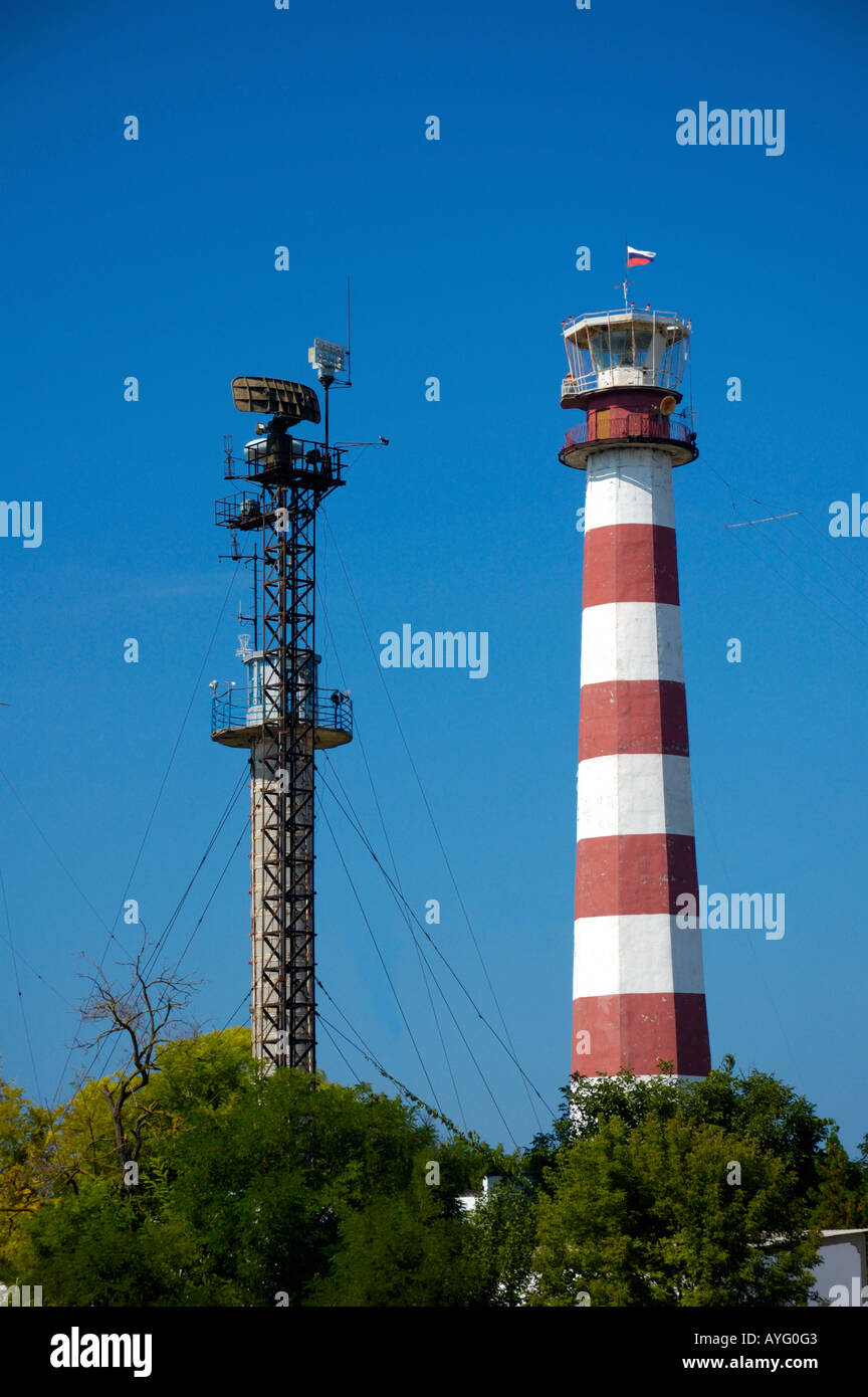 Lighthouse and radio beacon towers Stock Photo