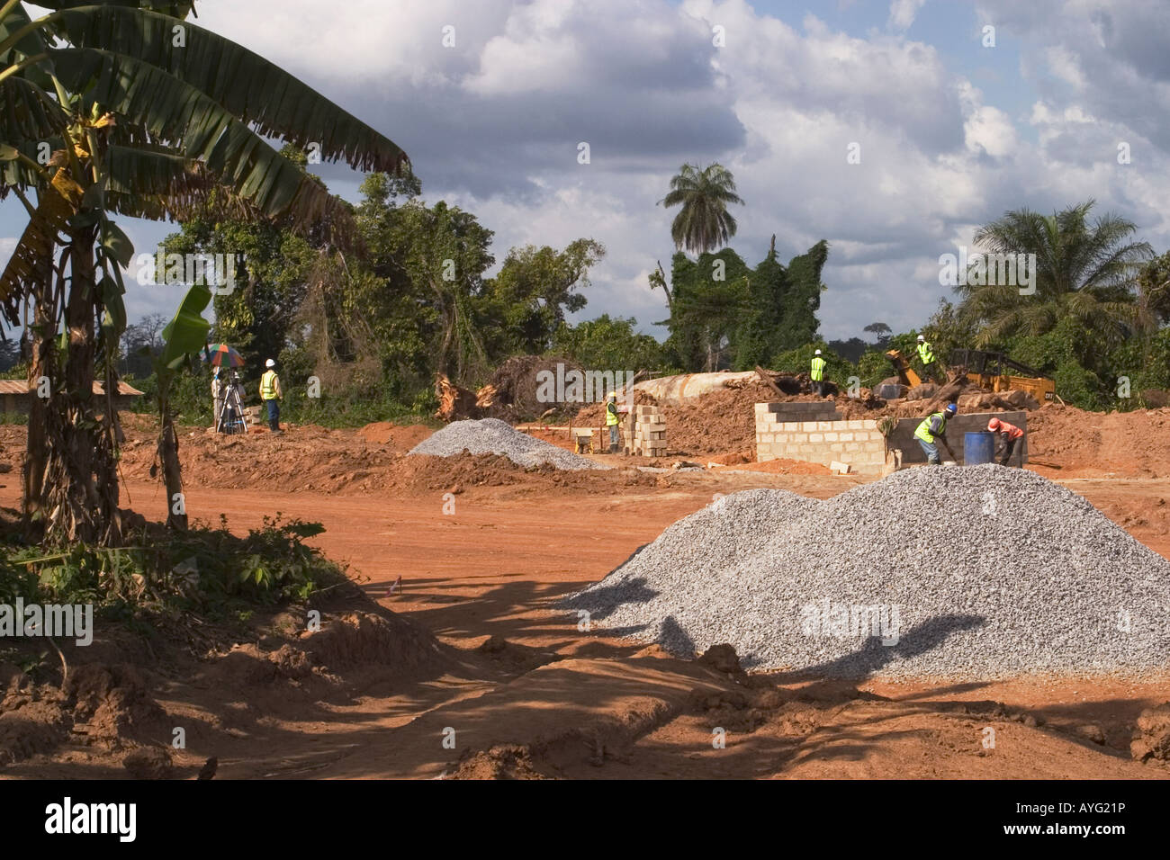 African construction workers building new houses in a village community, Ghana West Africa Stock
