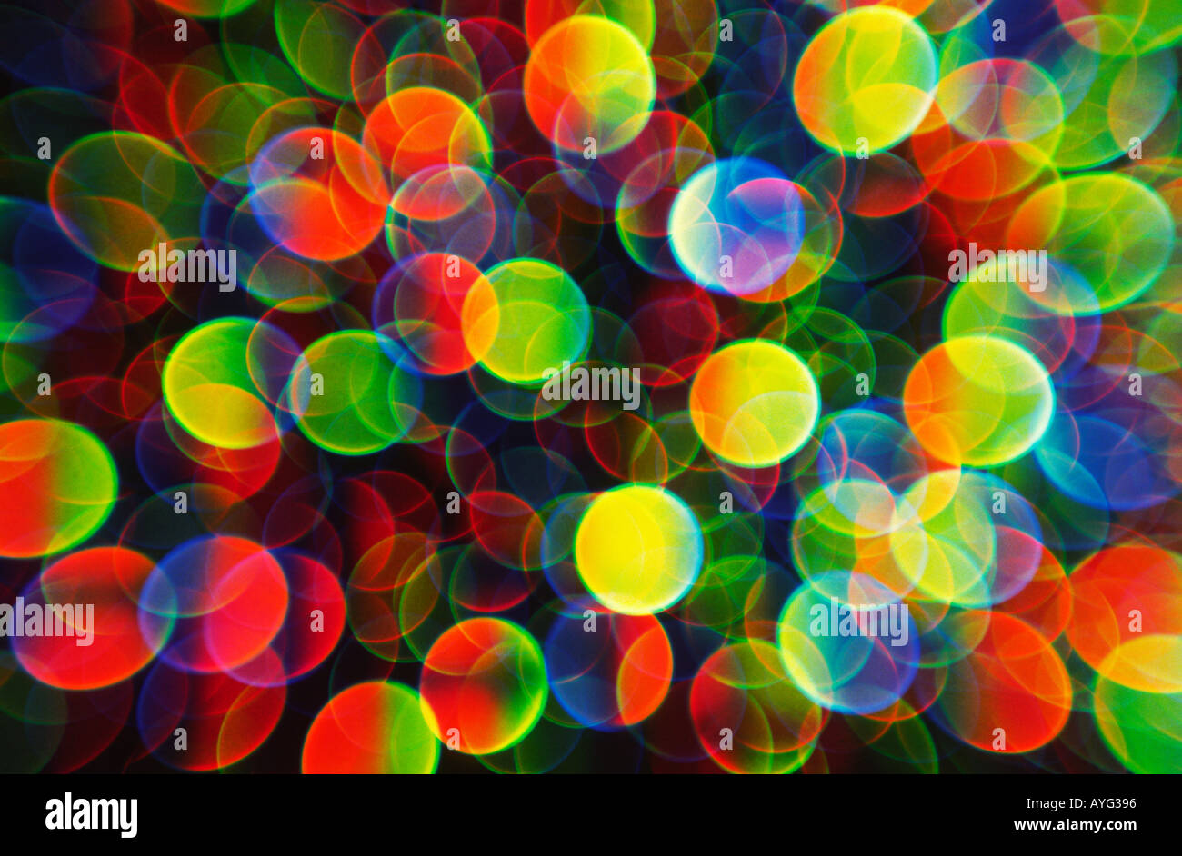 Spheres of light in an abstract multicoloured light pattern Stock Photo