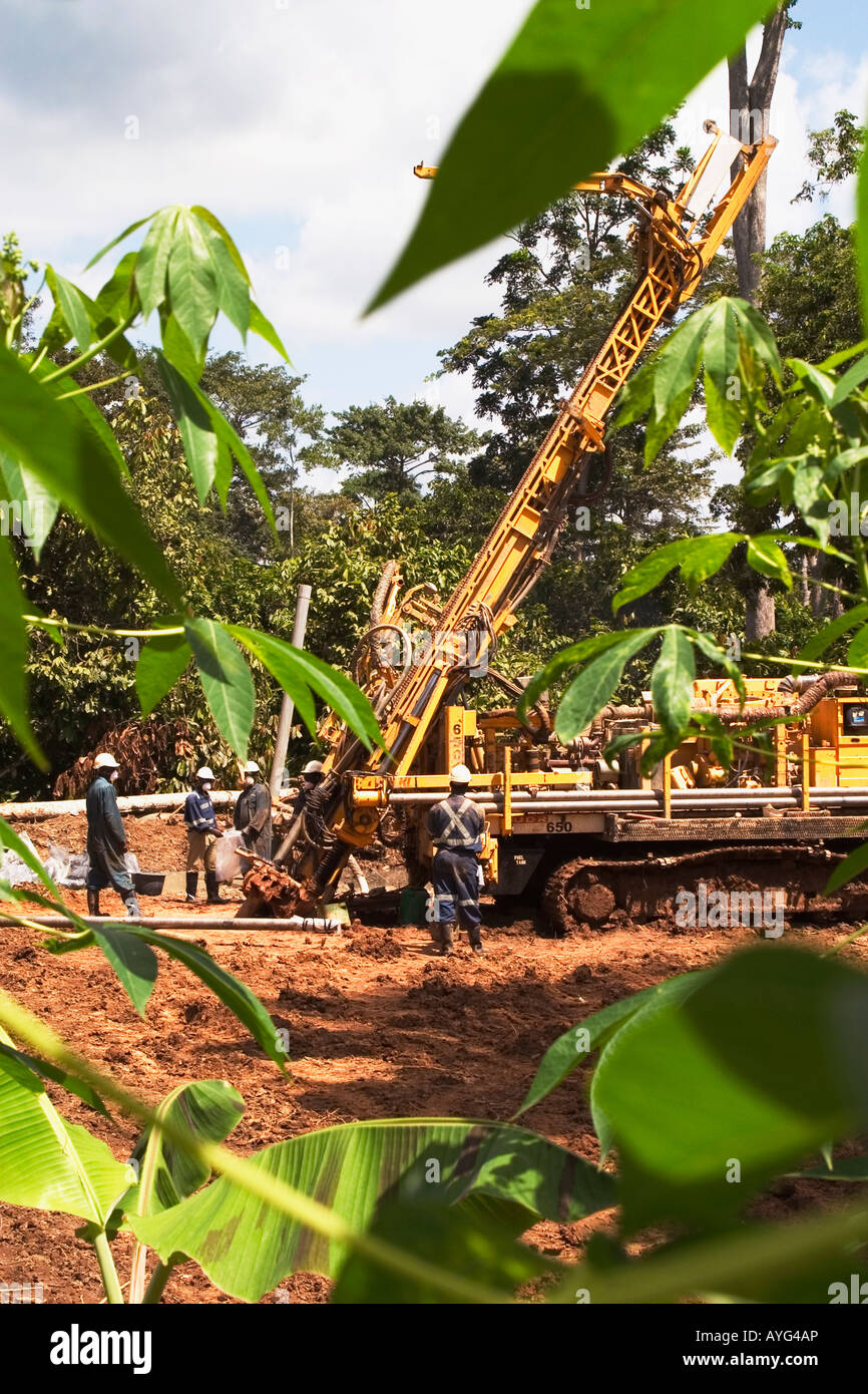 Exploration core drilling with RC drill rig in bush, surface gold mine