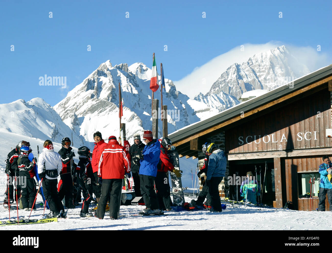 Ski school meeting place in the Italian ski resort of La Thuile with Mont Blanc in the background Stock Photo