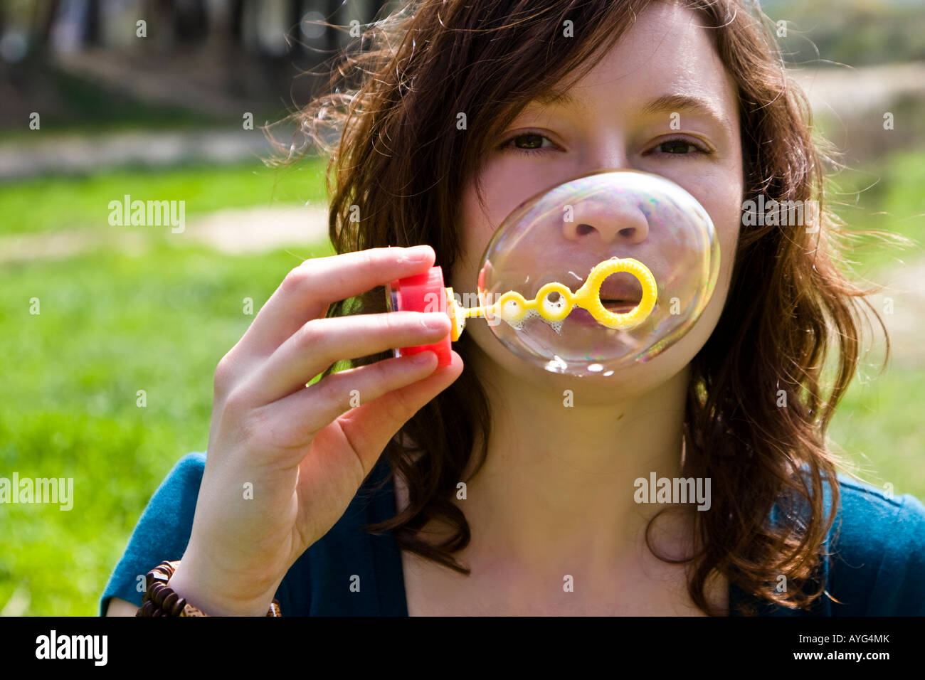 Woman red lips blowing soap hi-res stock photography and images - Alamy