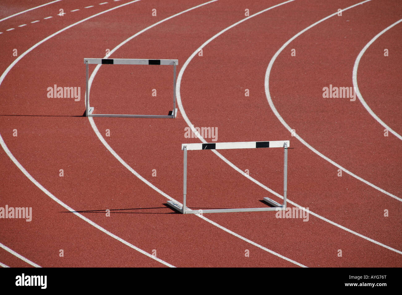 hurdles on athletic track Stock Photo Alamy