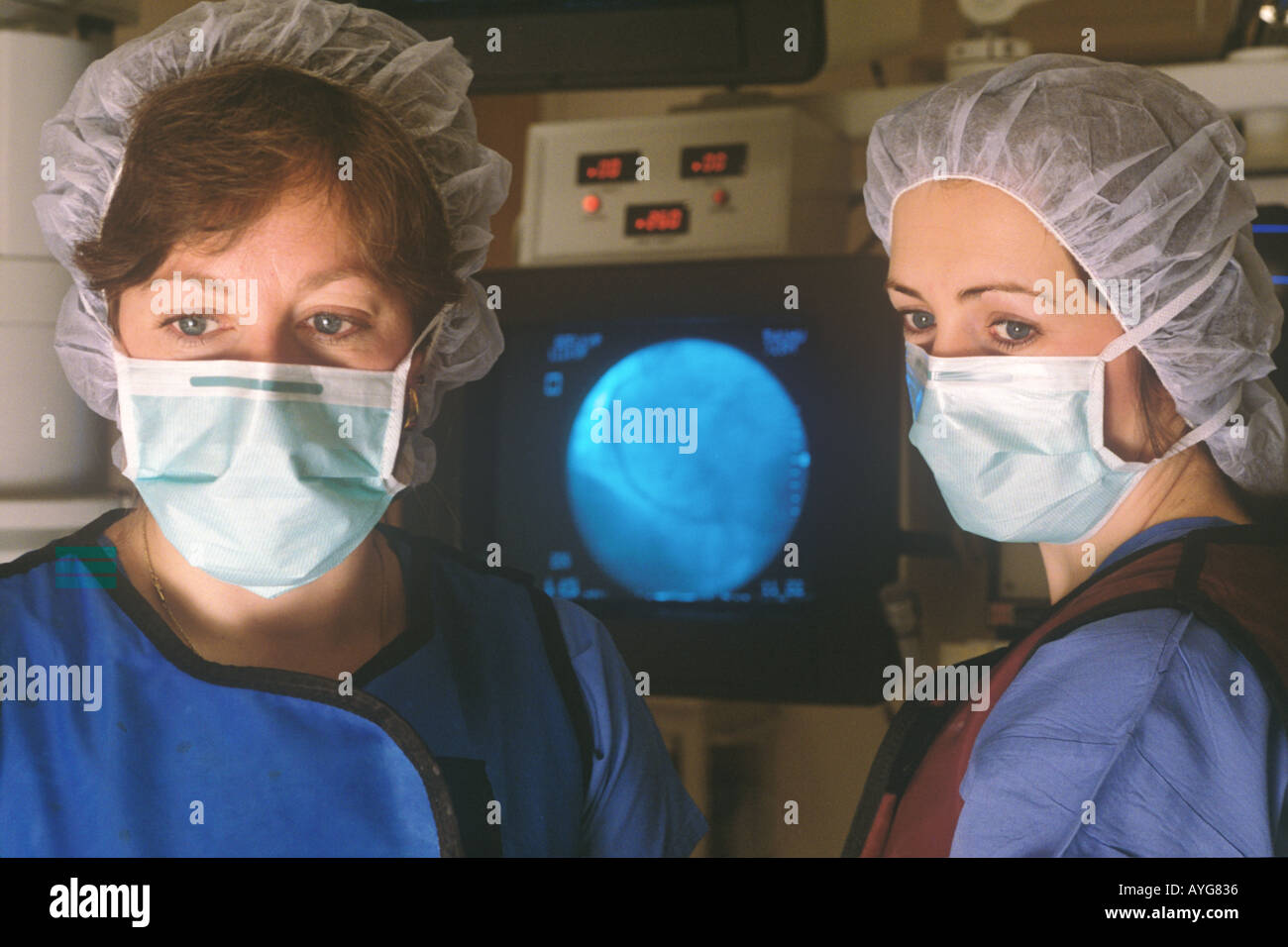 Angioplasty procedure registered nurses working in cardiac cath lab Stock Photo