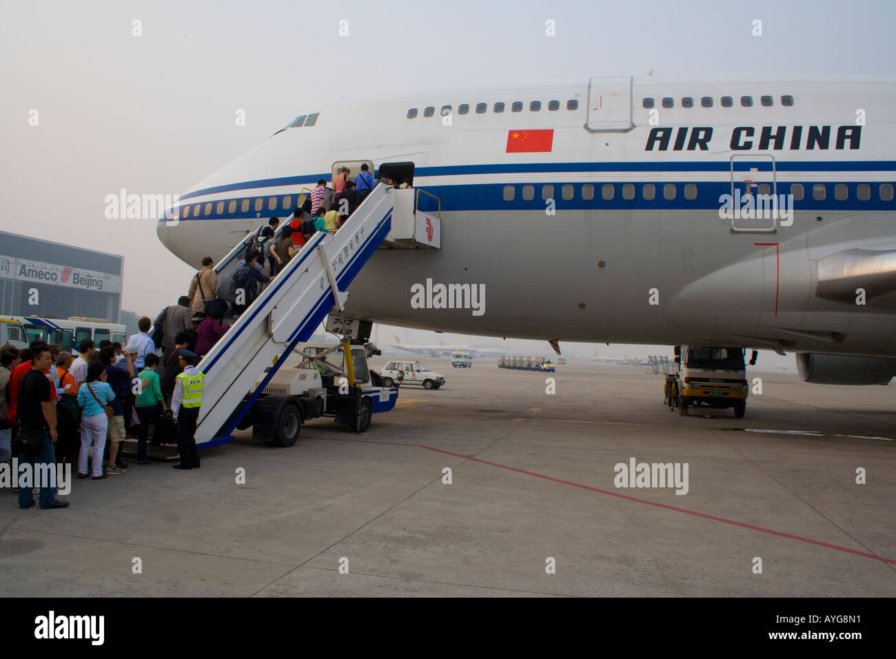 Passangers Boarding a China Air Airplane  Capital China International Airport Beijing  China PEK BJS Stock Photo