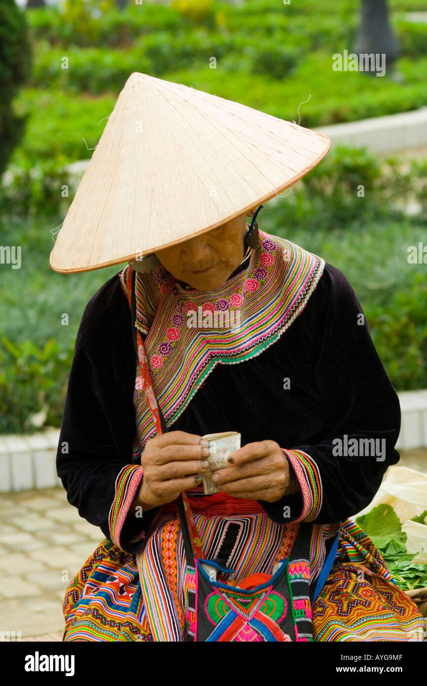 Flower Hmong Women Conducting a Transaction Bac Ha Market near Sapa Vietnam Stock Photo