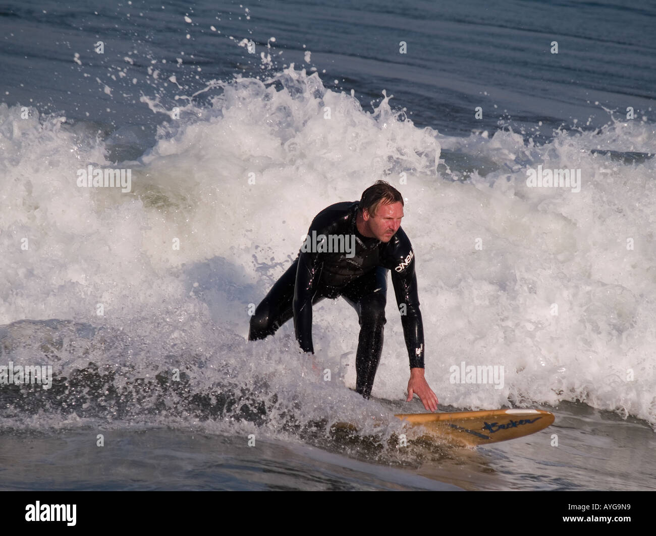 Surfer About To Get Up On His Surfboard Redondo Beach Ca Surfer About To Get Up On His Surfboard Redondo Beach Ca