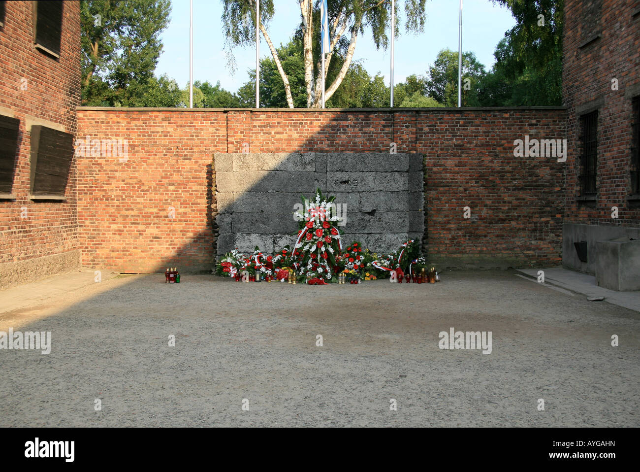 The Death Wall (execution wall) between Blocks 10 and 11, Auschwitz-Birkenau Museum, Oswiecim, Poland. Stock Photo