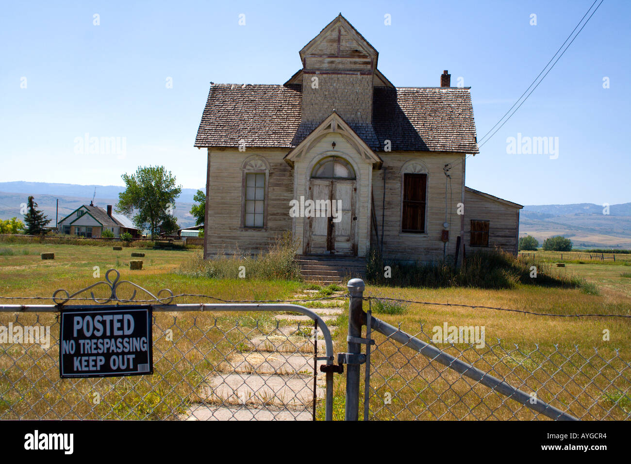 Old Deserted Mormon Church Posted No Trespassing Keep  Out Ovid a small town near Paris Idaho USA Stock Photo